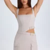 Acadia Belted Cut-Out Mini Dress in Taupe