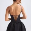 Anahita Lace-Up Bubble Hem Corset Micro Mini Dress in Black