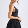 Anahita Lace-Up Bubble Hem Corset Micro Mini Dress in Black