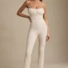 Arlena Bow-Detail Lace Flared Jumpsuit in Ivory