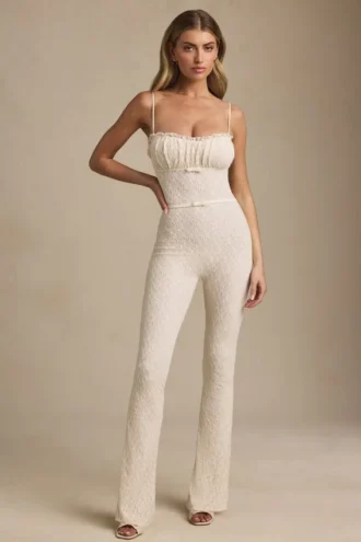Arlena Bow-Detail Lace Flared Jumpsuit in Ivory