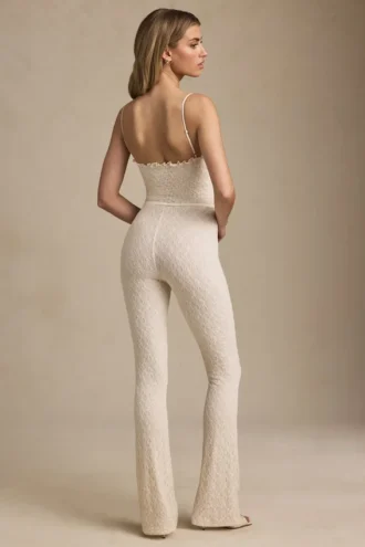 Arlena Bow-Detail Lace Flared Jumpsuit in Ivory