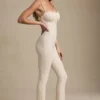 Arlena Bow-Detail Lace Flared Jumpsuit in Ivory