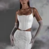 Asra Lace Up Mini Skirt in White