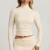 Auri Modal Ruched Backless Turtleneck Top in Ivory