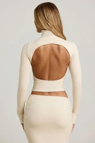 Auri Modal Ruched Backless Turtleneck Top in Ivory