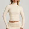 Auri Modal Ruched Backless Turtleneck Top in Ivory