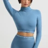 Backless Turtleneck Long-Sleeve Crop Top in Steel Blue