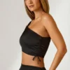 Brisa Ruched Asymmetric Crop Top in Black