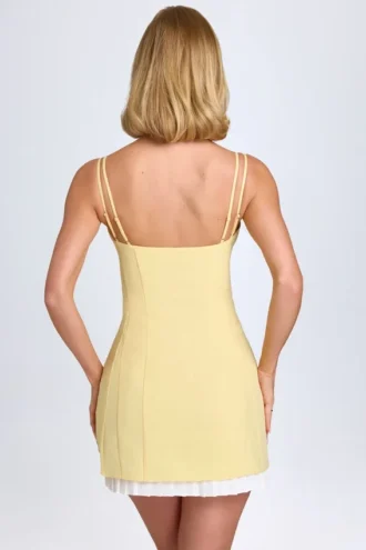 Bronwyn Bow-Detail Pleated Mini Dress in Pastel Yellow