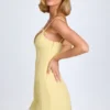 Bronwyn Bow-Detail Pleated Mini Dress in Pastel Yellow