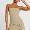 Bruna Woven Twill Wrap Over Pleated Mini Dress in Taupe