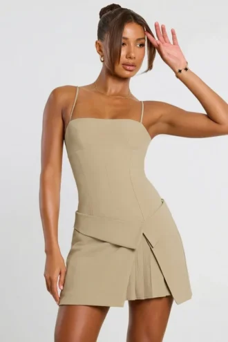 Bruna Woven Twill Wrap Over Pleated Mini Dress in Taupe