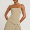Bruna Woven Twill Wrap Over Pleated Mini Dress in Taupe
