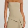 Bruna Woven Twill Wrap Over Pleated Mini Dress in Taupe