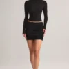 Cali Modal Ruched Mid-Rise Mini Skirt in Black