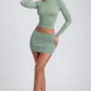Cali Modal Ruched Mid-Rise Mini Skirt in Sage Green