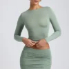 Cali Modal Ruched Mid-Rise Mini Skirt in Sage Green