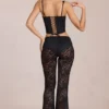 Calista Sheer Lace Mid-Rise Flared Trousers in Black