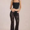Calista Sheer Lace Mid-Rise Flared Trousers in Black