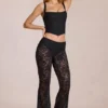 Calista Sheer Lace Mid-Rise Flared Trousers in Black