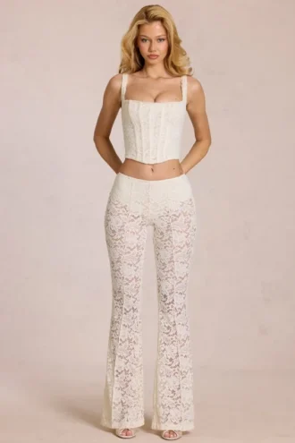 Calista Sheer Lace Mid-Rise Flared Trousers in Ivory