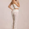 Calista Sheer Lace Mid-Rise Flared Trousers in Ivory