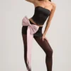 Carola Satin Bow-Detail Low-Rise Mini Skirt in Black