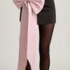 Carola Satin Bow-Detail Low-Rise Mini Skirt in Black