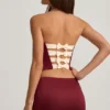 Carola Satin Bow-Detail Low-Rise Mini Skirt in Wine Red