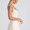 Cassandra Ruffle-Trim Button-Detail Corset Mini Dress in Ivory