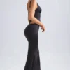 Ceres Mid-Rise Fishtail Maxi Skirt in Black