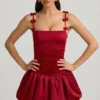 Cirilla Bow-Detail Ruched Bubble Hem Mini Dress in True Red