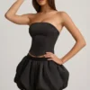 Clemmy Bubble Hem Mid-Rise Mini Skirt in Black
