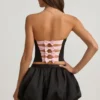 Clemmy Bubble Hem Mid-Rise Mini Skirt in Black