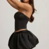 Clemmy Bubble Hem Mid-Rise Mini Skirt in Black