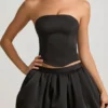Clemmy Bubble Hem Mid-Rise Mini Skirt in Black