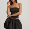 Clemmy Bubble Hem Mid-Rise Mini Skirt in Black