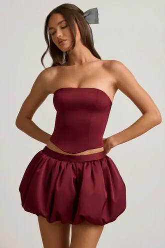 Clemmy Bubble Hem Mid-Rise Mini Skirt in Wine Red