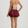 Clemmy Bubble Hem Mid-Rise Mini Skirt in Wine Red
