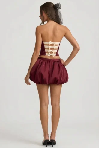 Clemmy Bubble Hem Mid-Rise Mini Skirt in Wine Red