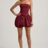 Clemmy Bubble Hem Mid-Rise Mini Skirt in Wine Red