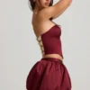 Clemmy Bubble Hem Mid-Rise Mini Skirt in Wine Red