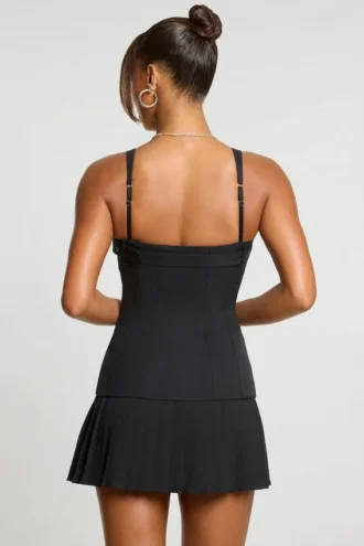 Clover Brushed Twill Drop Waist Kilt Mini Dress in Black