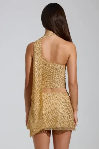 Cosette Embellished Asymmetric Scarf-Detail Top in Gold