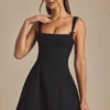 Cressida Bow-Detail Pleated A-Line Mini Dress in Black