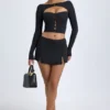 Dalla Modal Button-Detail Low-Rise Mini Skirt in Black