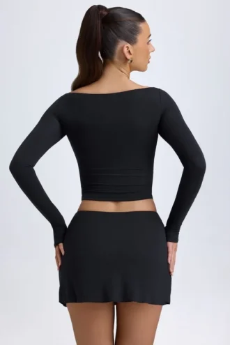 Dalla Modal Button-Detail Low-Rise Mini Skirt in Black