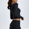 Dalla Modal Button-Detail Low-Rise Mini Skirt in Black