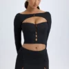 Dalla Modal Button-Detail Low-Rise Mini Skirt in Black